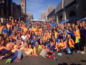 Runners join in a group photo wearing a combination of 2013 and 2014 Adidas jackets (Photo courtesy of: Deseret News http://www.deseretnews.com/article/865601516/2014-Boston-Marathon-helped-us-all-heal.html?pg=all) 